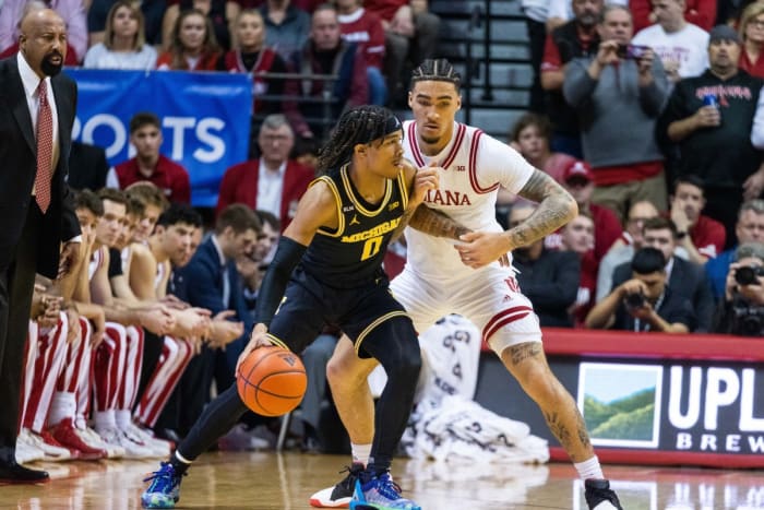 Indiana guard Jalen Hood-Schifino (1) plays tight defense.